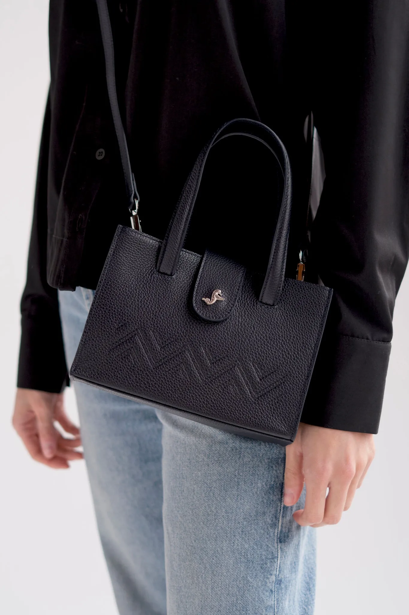 Mini leather crossover tote in dark navy